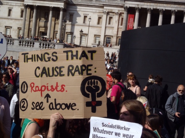 Slutwalk sign "Things that cause rape: (1) Rapists (2) See above"